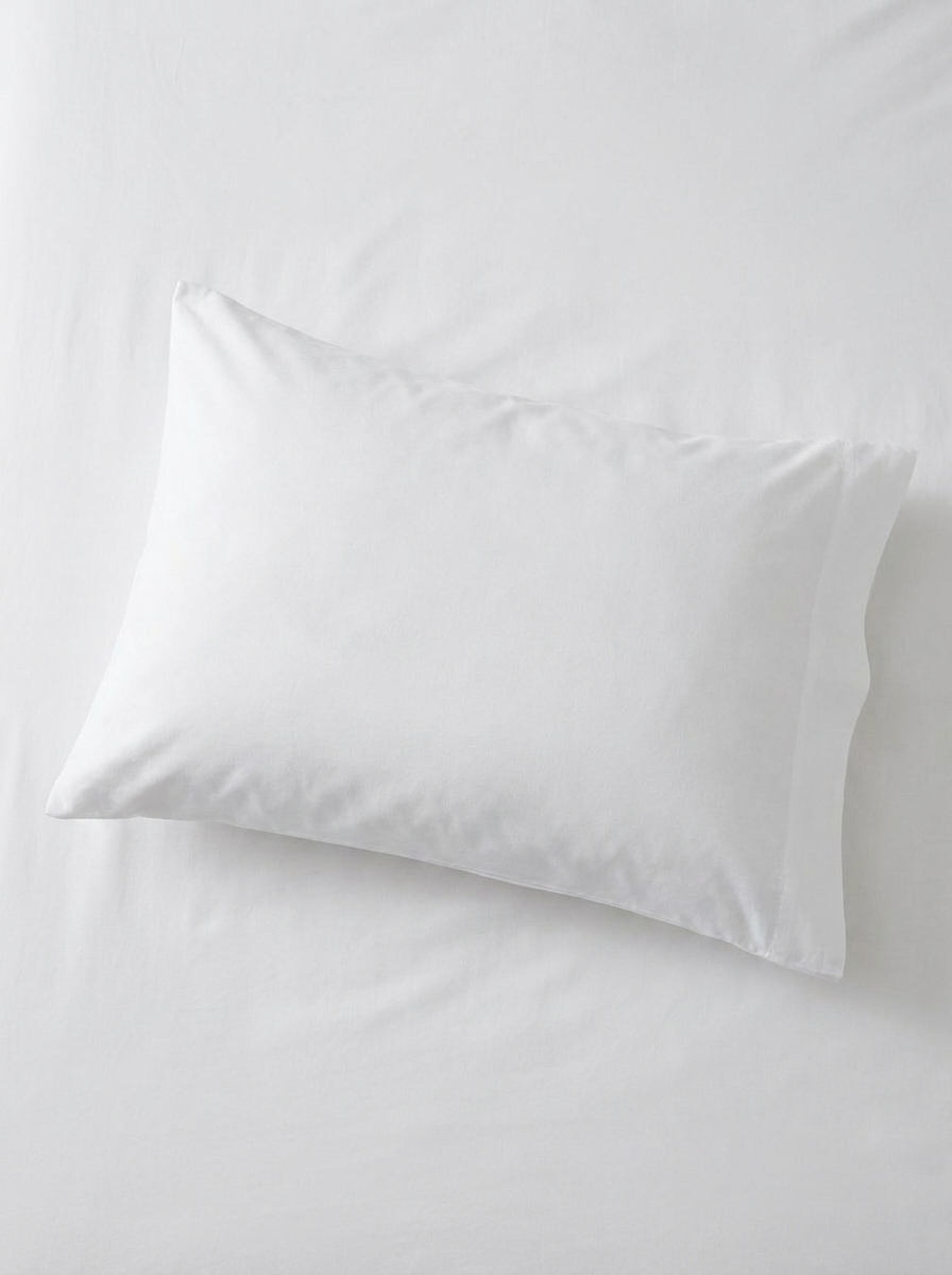 Close detail of Bast & Co pillowcase fabric, true white